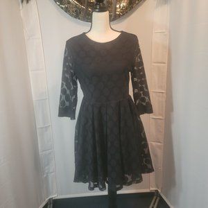 H & M size medium,  black fit and flair long sleeved dress.